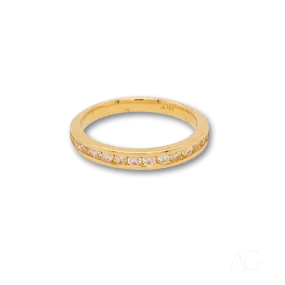 Essence of Radiance: The 18k Gold Ring Adorned with CZ